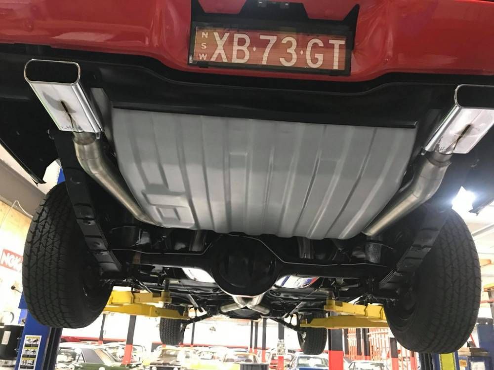 The Bottom of a Car With Exhaust Pipes — Restore Your Ford Falcon GT From Brisbane, NSW