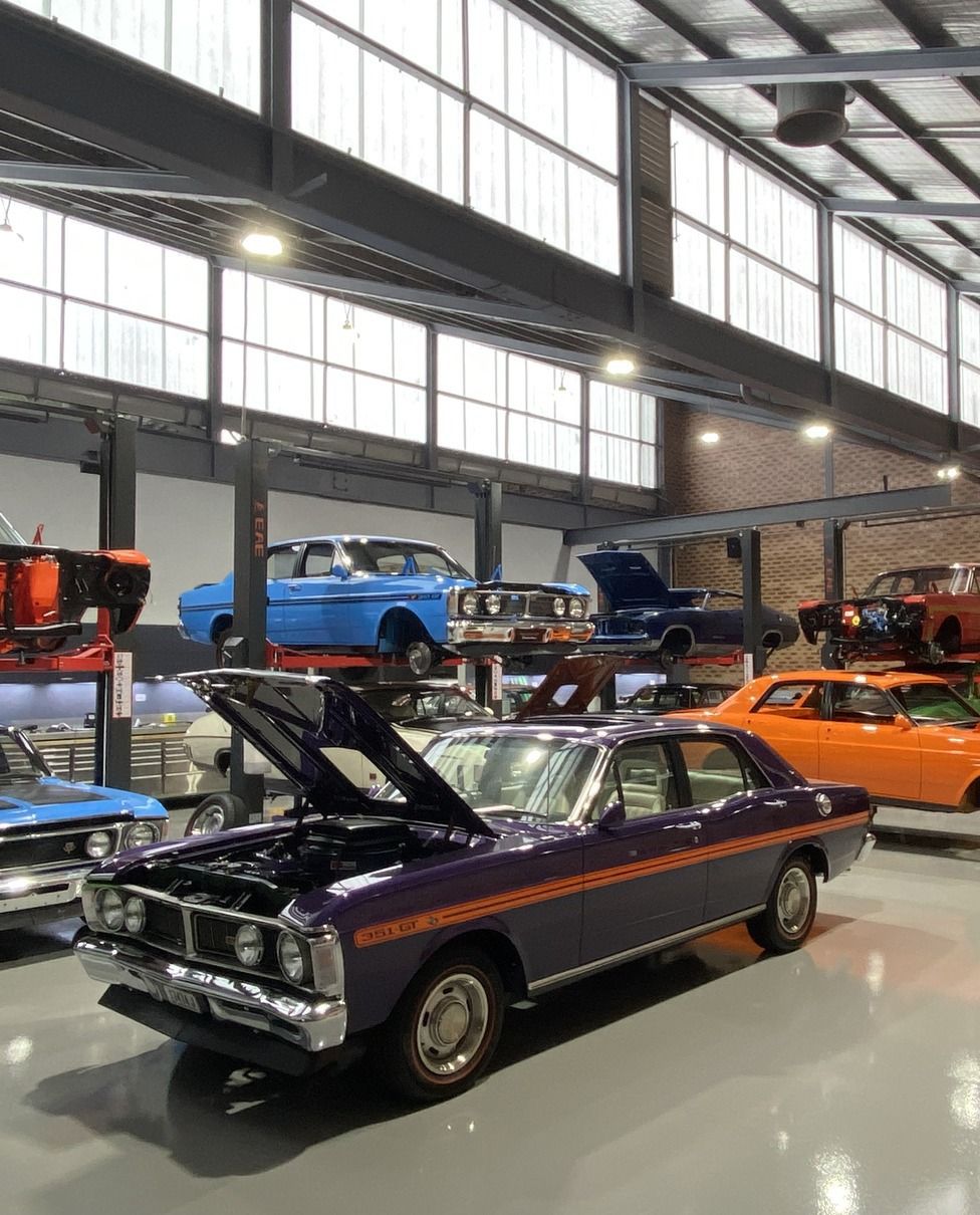 Red Car with A Wooden Steering Wheel — We Restore & Produce Falcon GT Replicas in Sydney, NSW