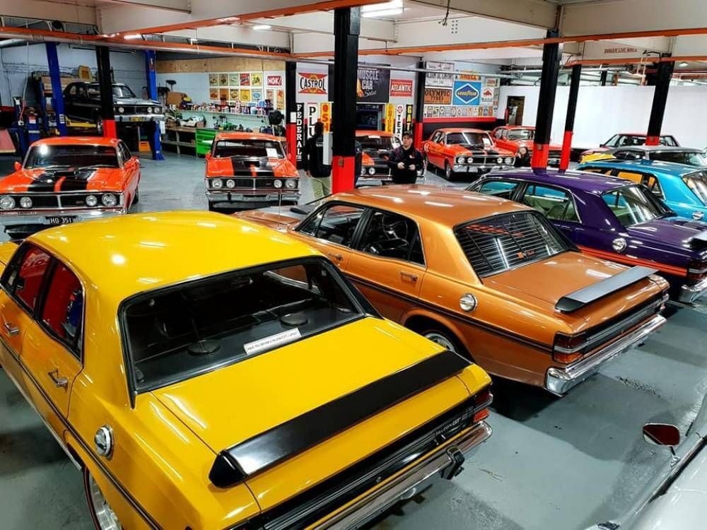 A Collection of Unique Vehicles in a Garage — Restore Your Ford Falcon GT in Australia