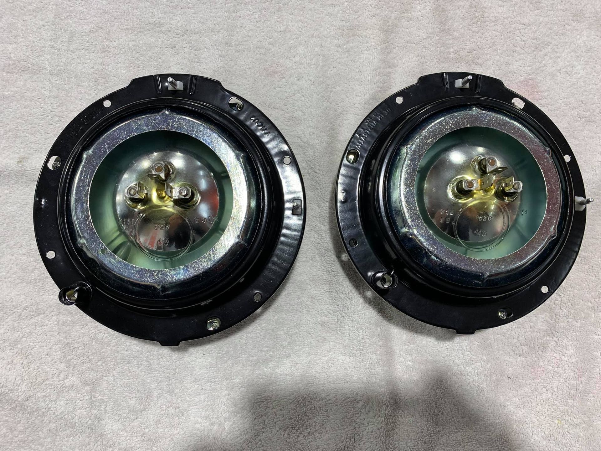 A Pair of Round Black and Silver Objects — Restore Your Ford Falcon GT in Australia