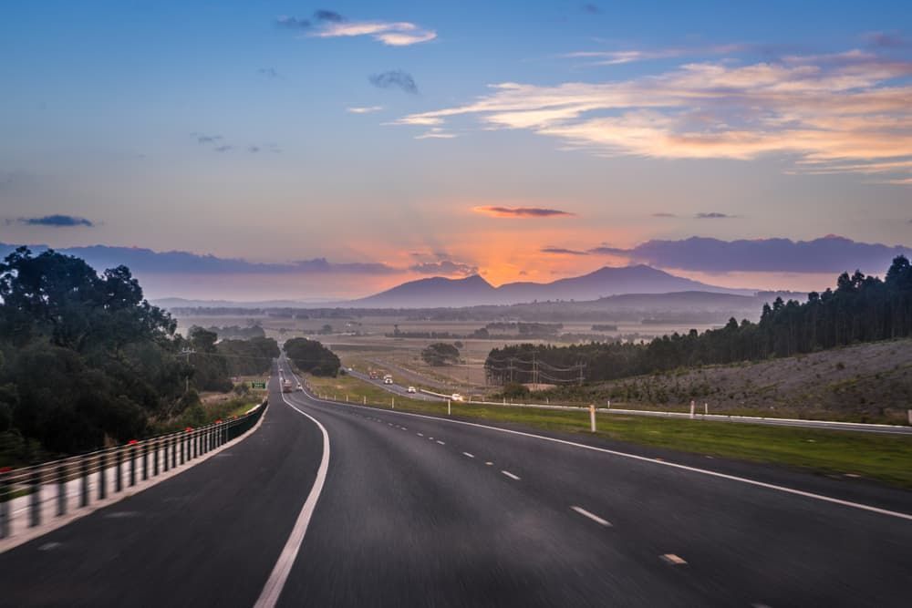 Australian Highway Leading to the Horizon at Sunset — Restore Your Ford Falcon in Australia
