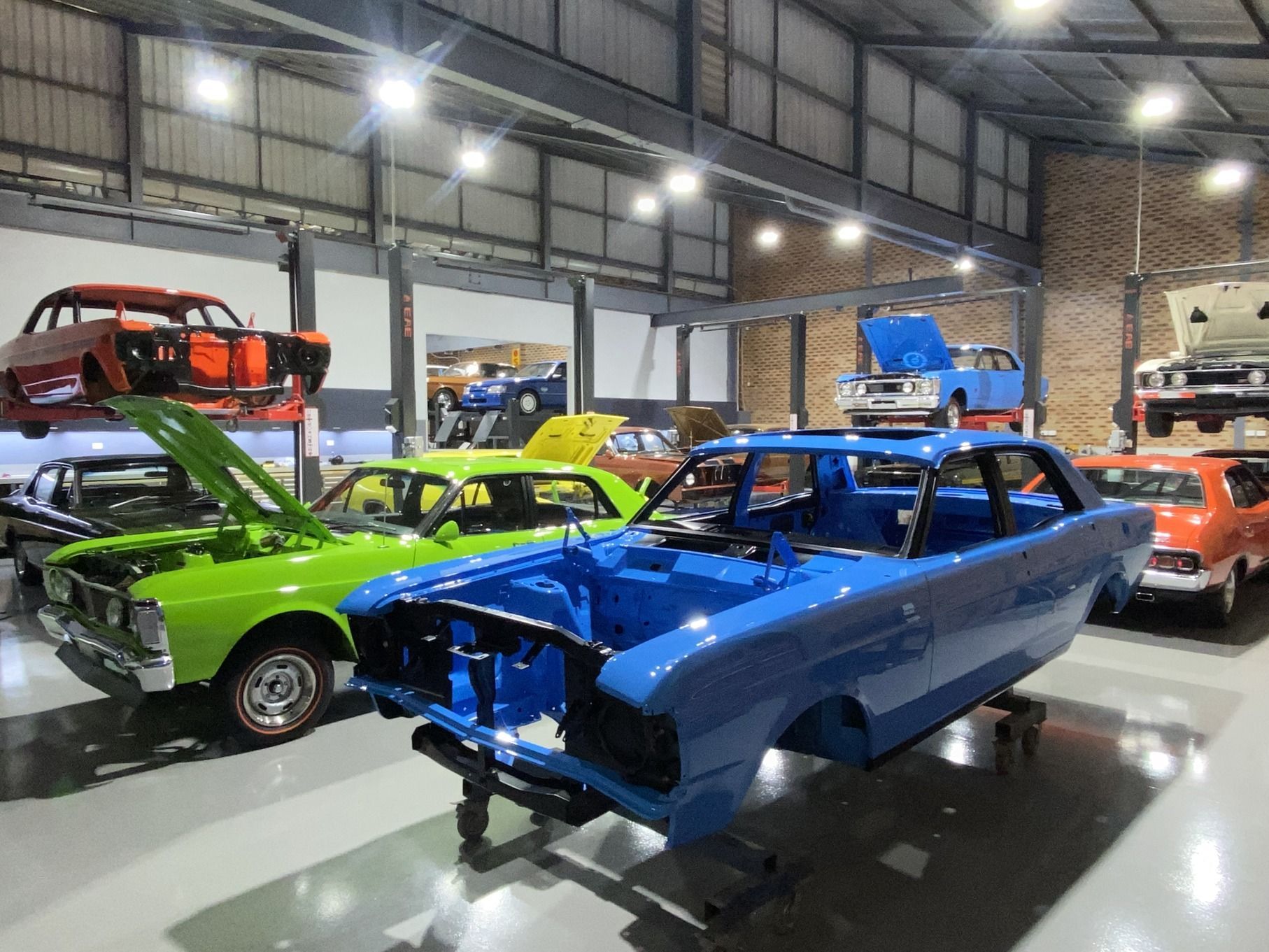 Front of Red Car with Two Headlights  — We Restore & Produce Falcon GT Replicas in Sydney, NSW