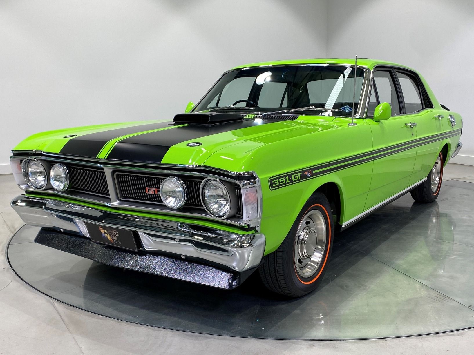 A Collection of Vehicles in a Garage — We Restore & Produce Falcon GT Replicas in Sydney, NSW