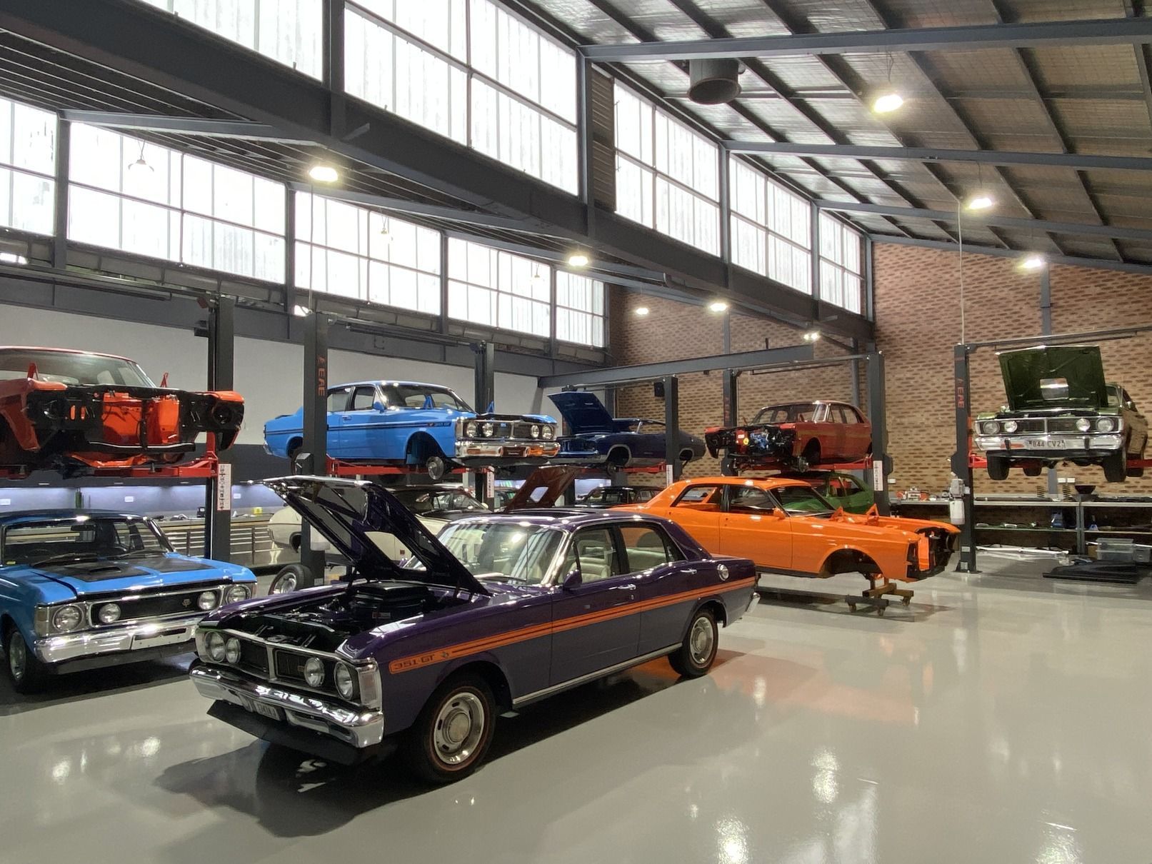 Red Car with A Wooden Steering Wheel — We Restore & Produce Falcon GT Replicas in Sydney, NSW