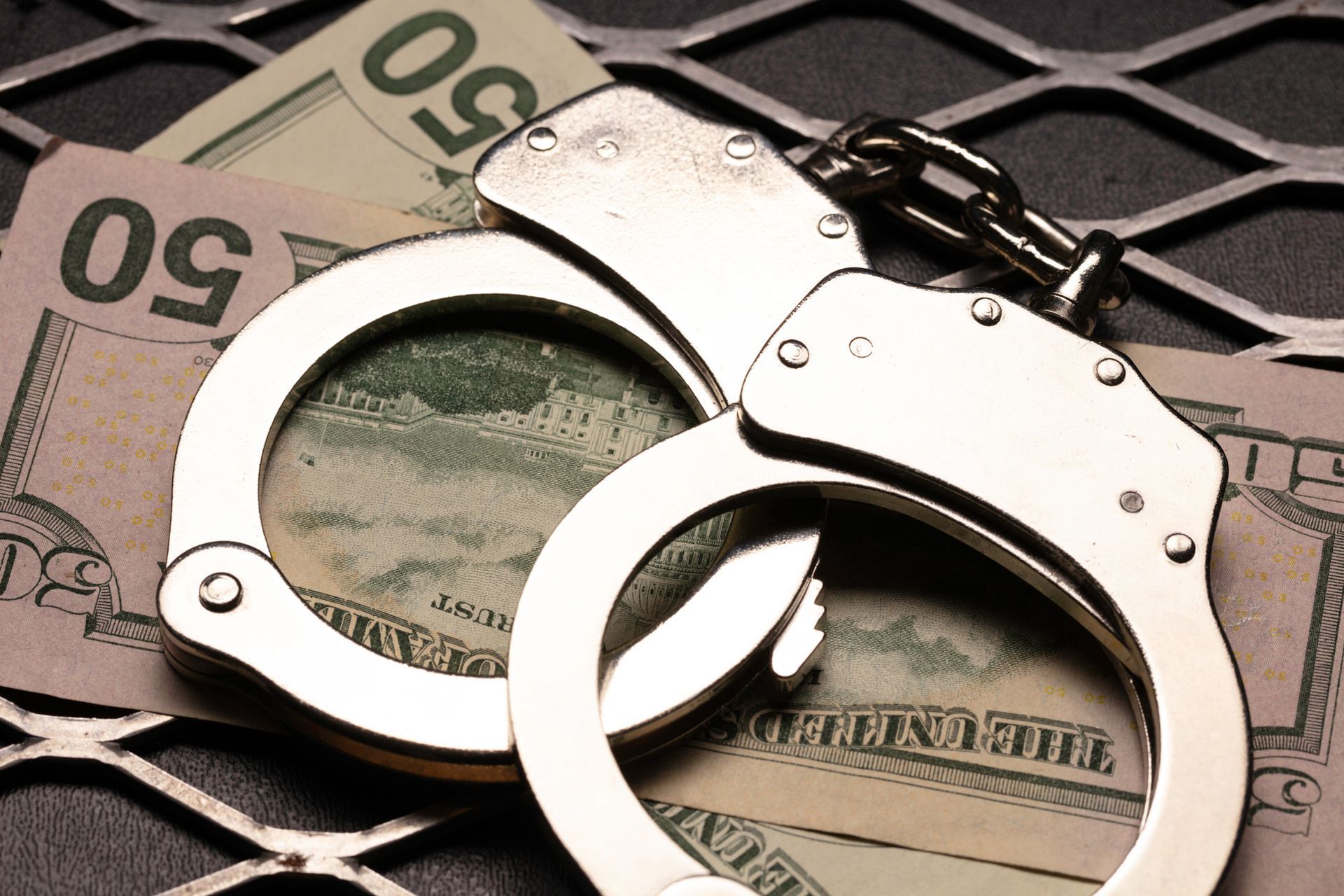 Handcuffs and Money — Salinas, CA — Jose A. Gonzalez Bail Bonds Inc.,