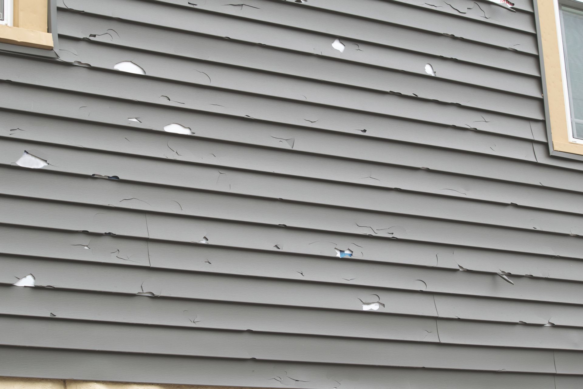 cracked or warped siding