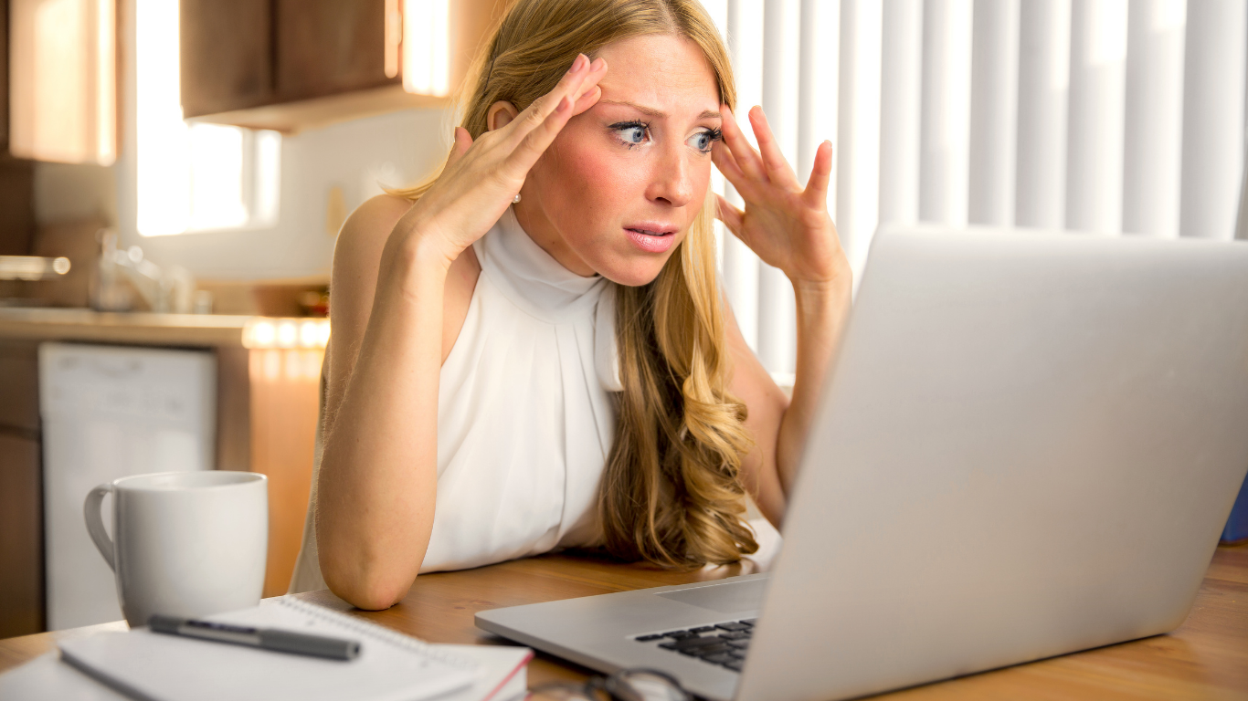 Frustrated Woman Waiting For Website To Load On Laptop
