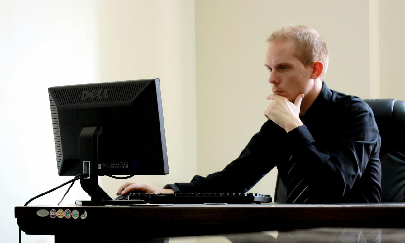 Man-Whiteboard-Checklist