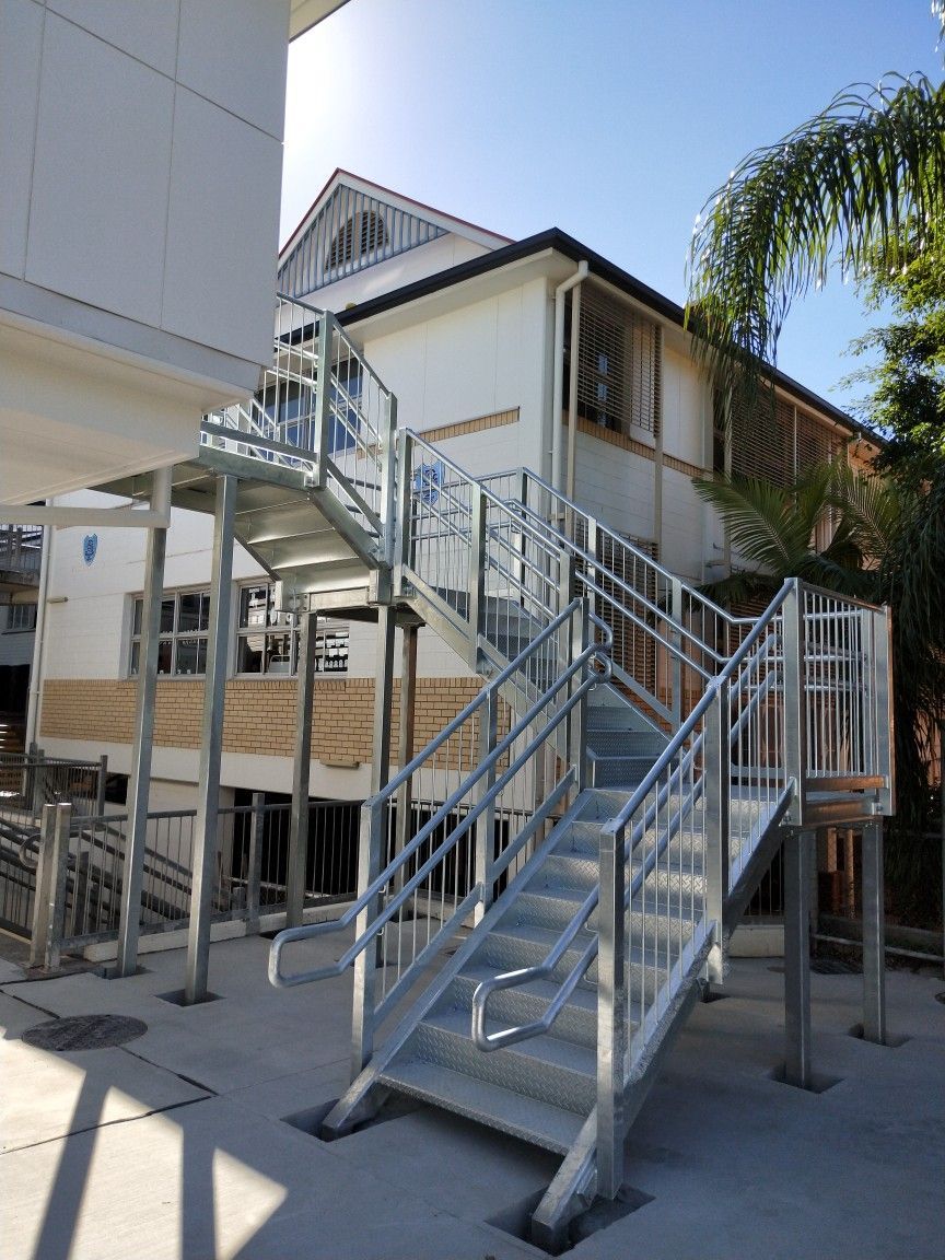 A set of stairs leading up to a building