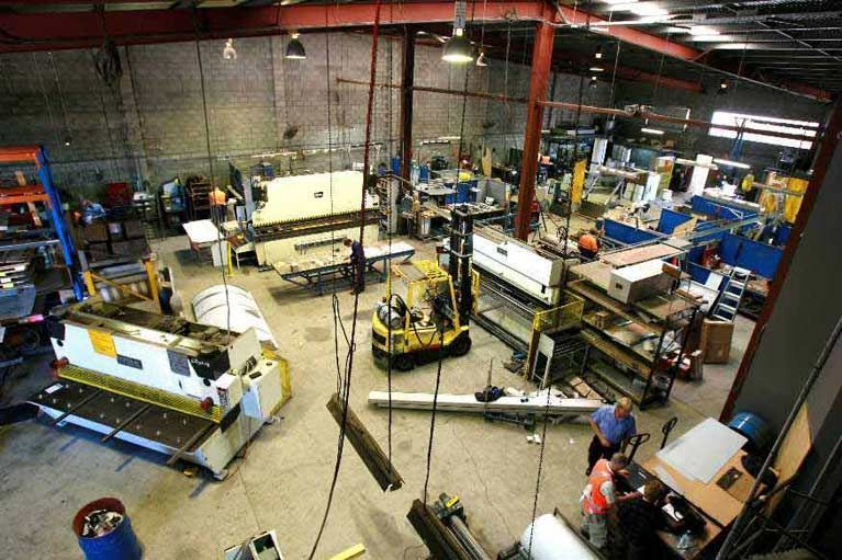 An aerial view of a factory with lots of machinery