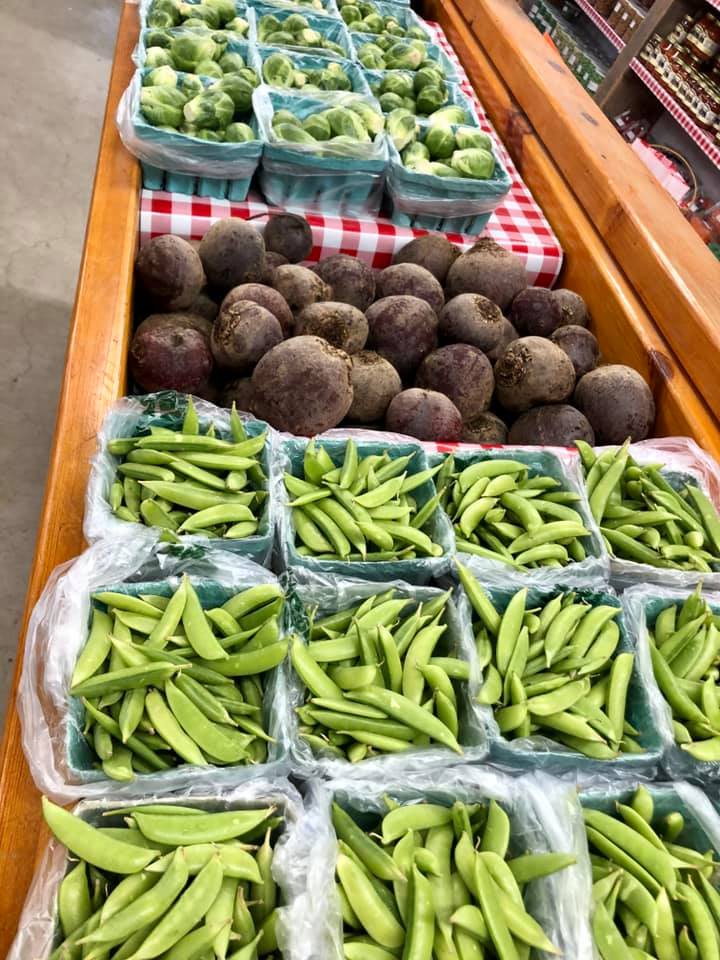 There are many different types of vegetables on the table.