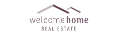 A logo for a real estate company called welcome home real estate.