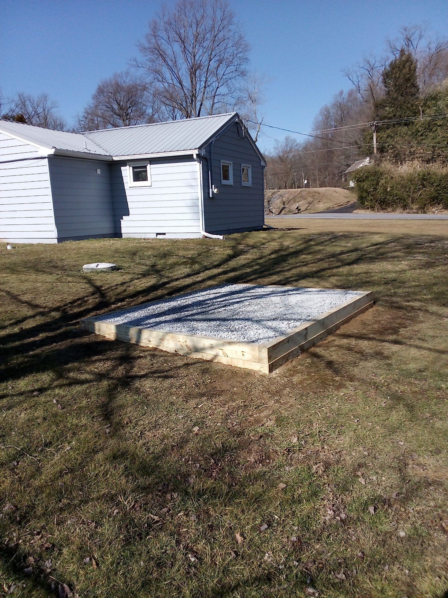 Shed foundation in a backyard