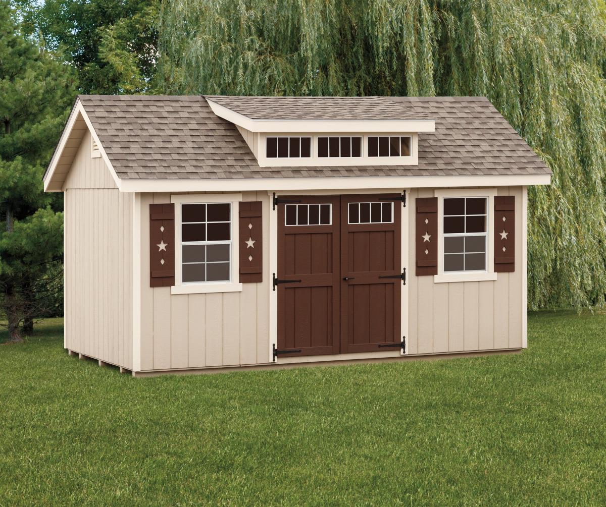 Dormer Shed with light tan wood siding, beige trim, a set of dark brown double doors with windows, 1 white windows with dark brown shutters with star cut-outs, a transom dormer, and a light brown asphalt roof.