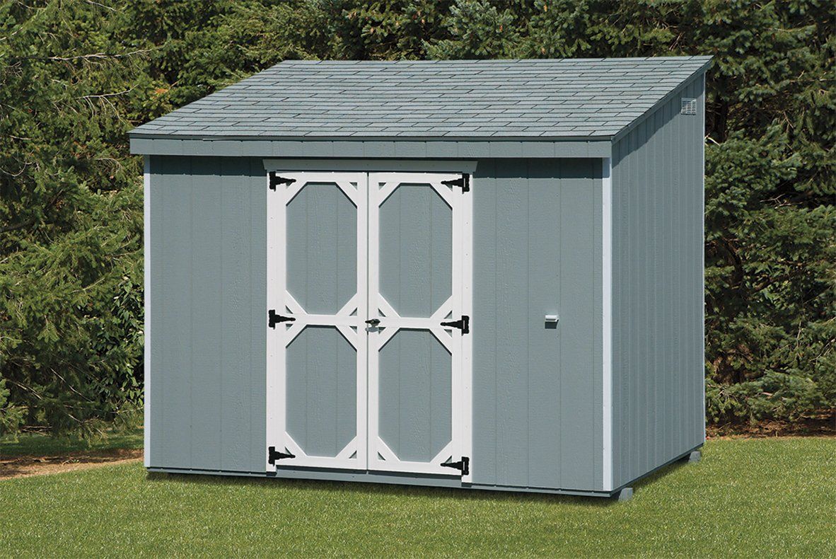 grey lean-to shed with white door