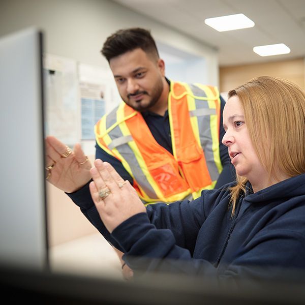 Black OE employee with safety equipment