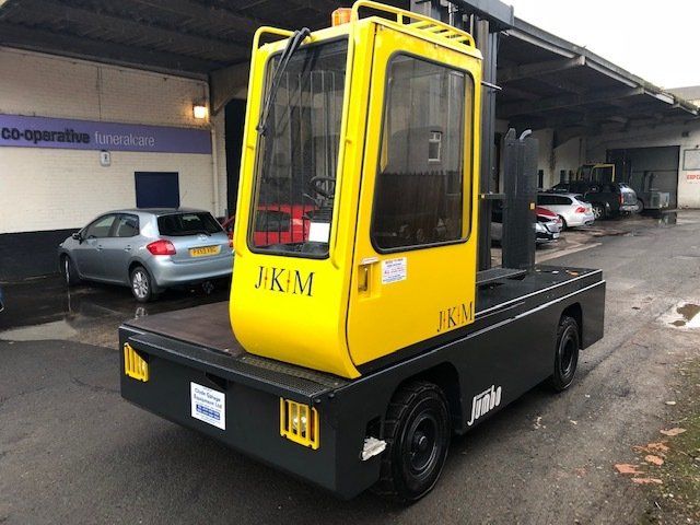Yellow side loader driver canopy
