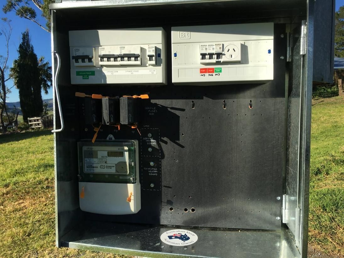 A Metal Box Filled With Electrical Equipment — DG Electrical & Fire In Kiama, NSW