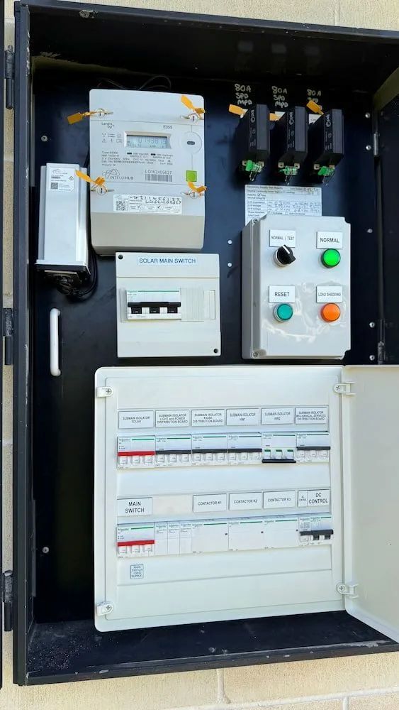 A Black Box With a Bunch of Electrical Equipment — DG Electrical & Fire In Kiama, NSW