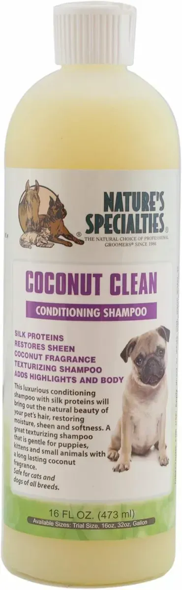 A bottle of coconut clean dog shampoo with a pug puppy on the label.