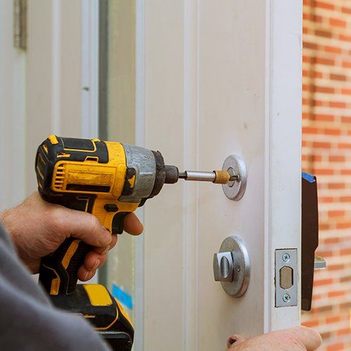 Fixing The Door Lock — Denver, CO — Triple B Lock & Key