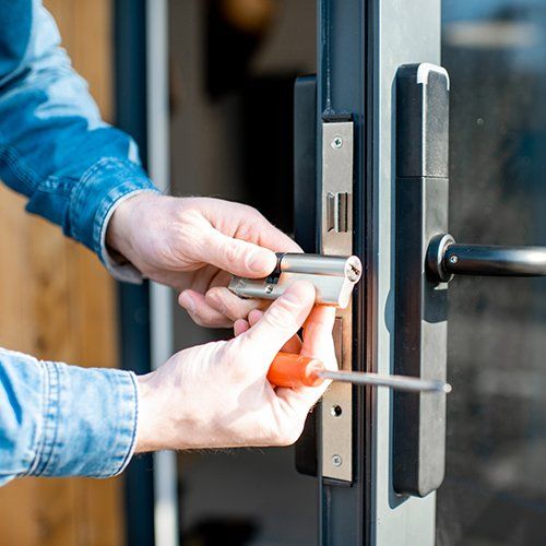 Fixing The Commercial Door — Denver, CO — Triple B Lock & Key