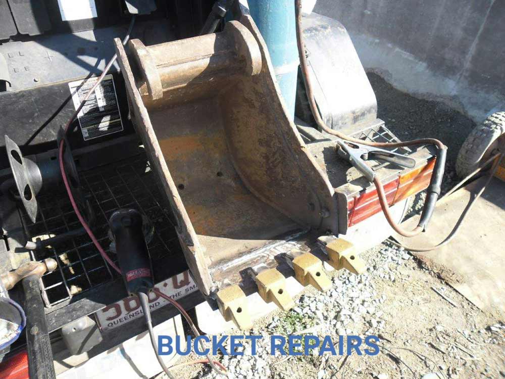 repaired bulldozer bucket with a claw