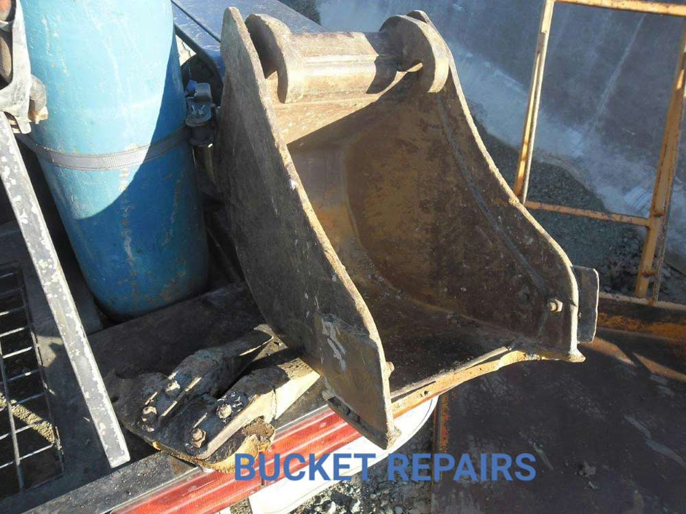 repaired bulldozer bucket