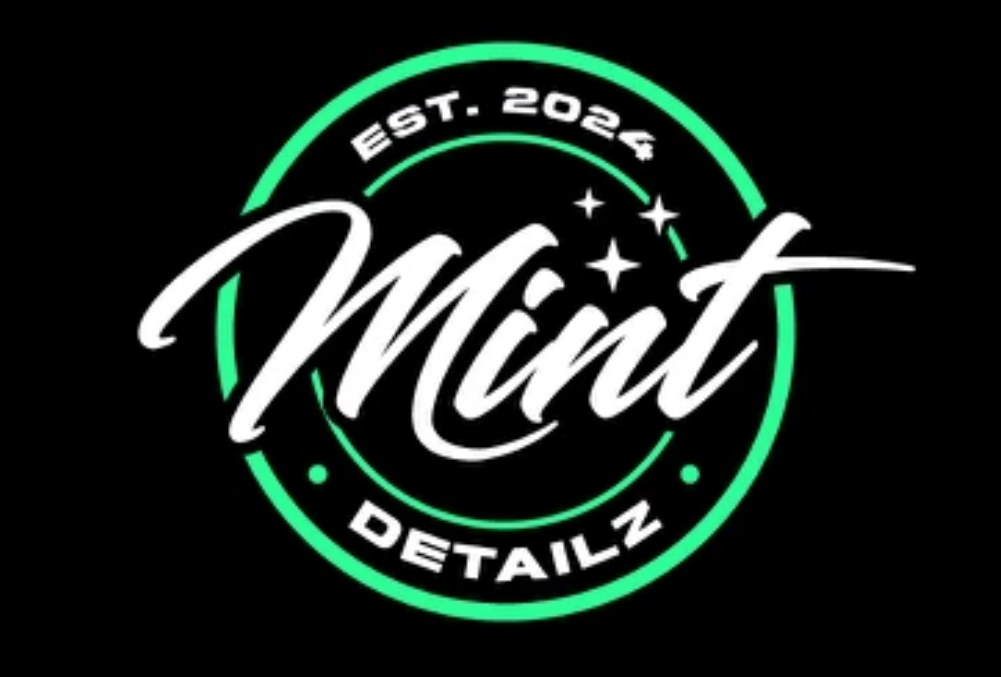 A mint detailz logo on a black background