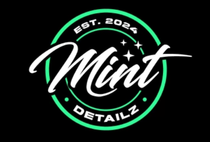 A mint detailz logo on a black background