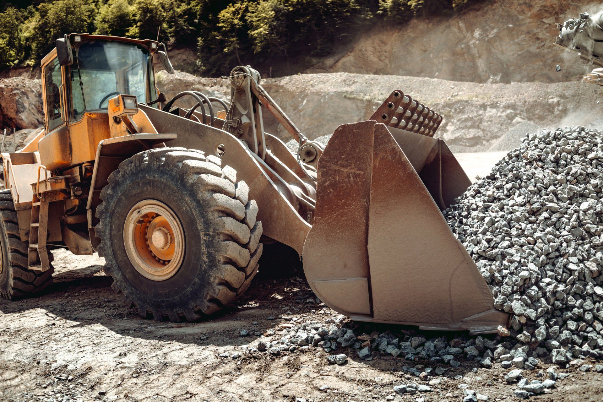 Atkins Will Bring a Wheel Loader to Your Mid-MO Business for When You Need Gravel Storage Lots.