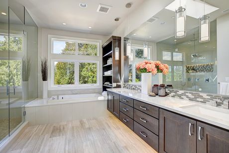 a huge bathroom with cabinets