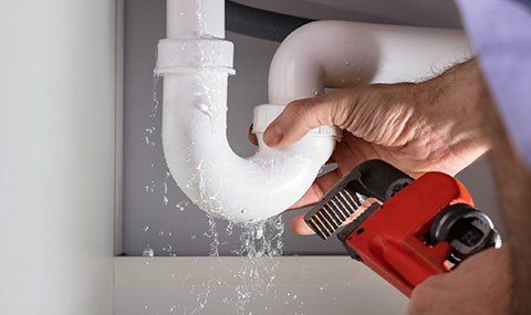 Plumber Fixing Sink Pipe — Spring Valley, CA — Infinity Plumbing & Construction Inc.