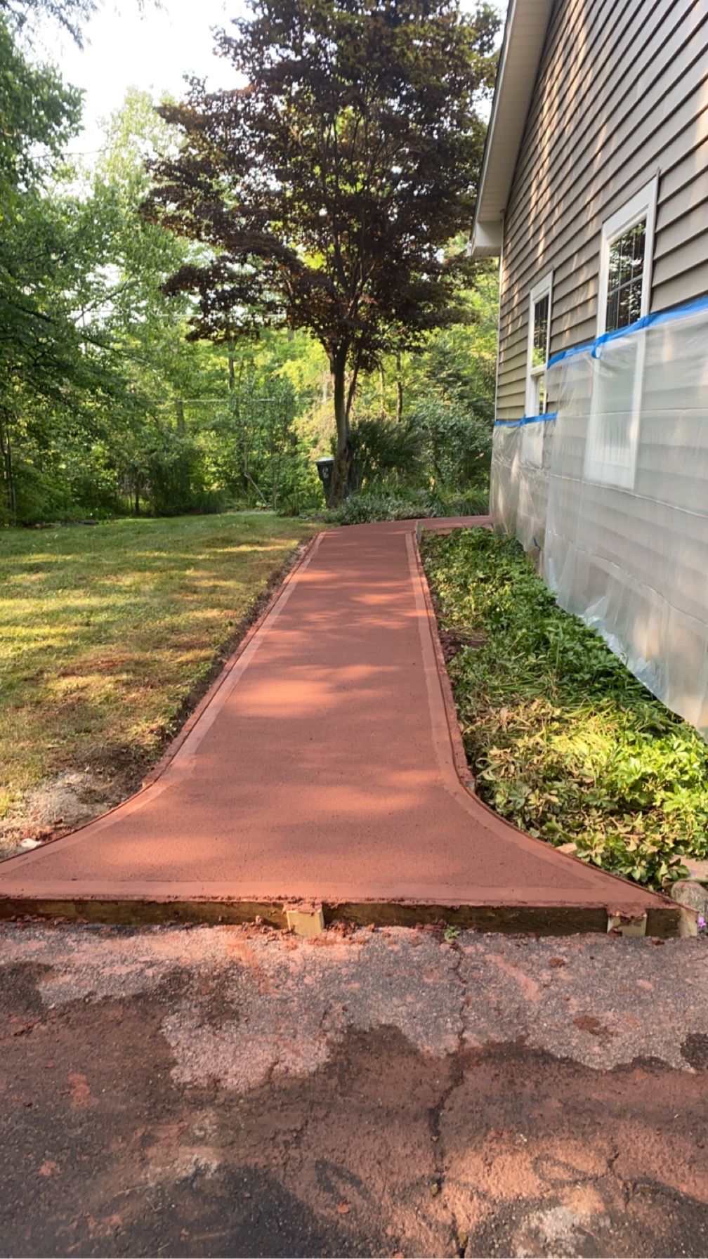 Concrete Walkway Leading to House  2 — Erie, PA — Saldana Services LLC