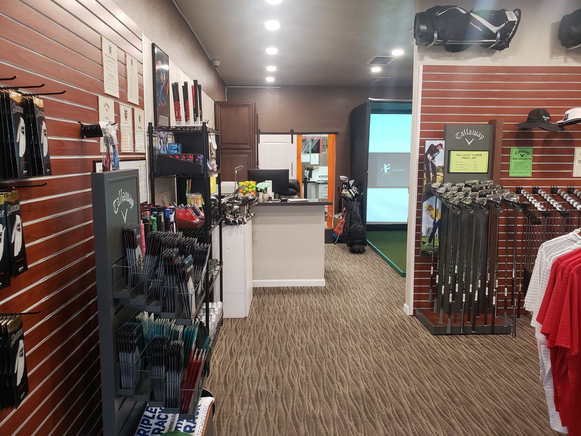 A store filled with lots of golf equipment and clothes.