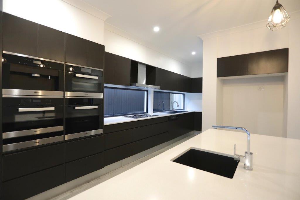 Kitchen with black cabinet