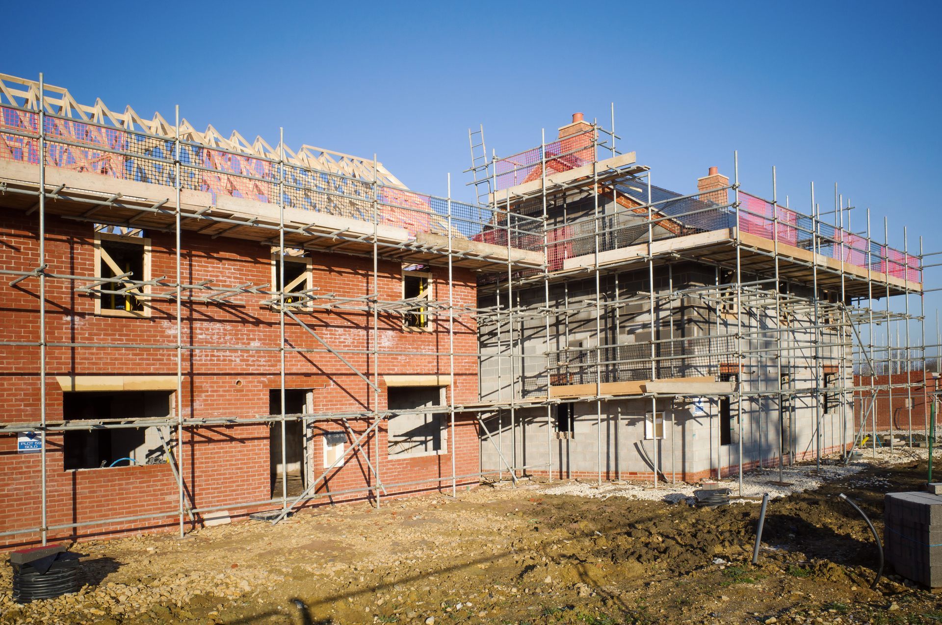 A building under construction with scaffolding around it