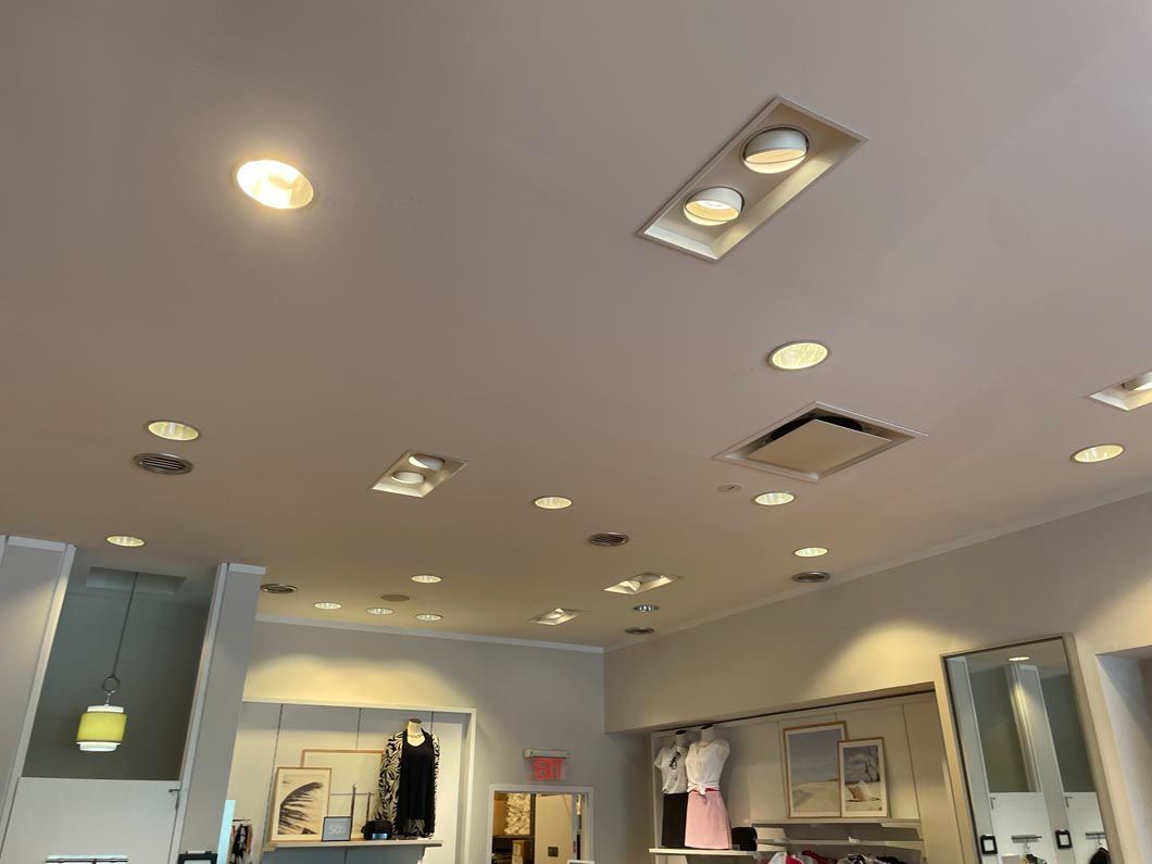 A store with a lot of lights on the ceiling