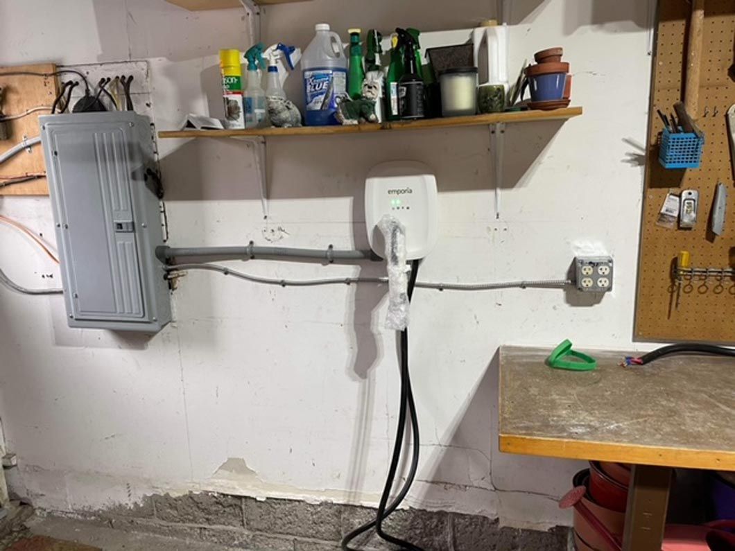 There is a shelf with bottles of cleaning supplies on it.