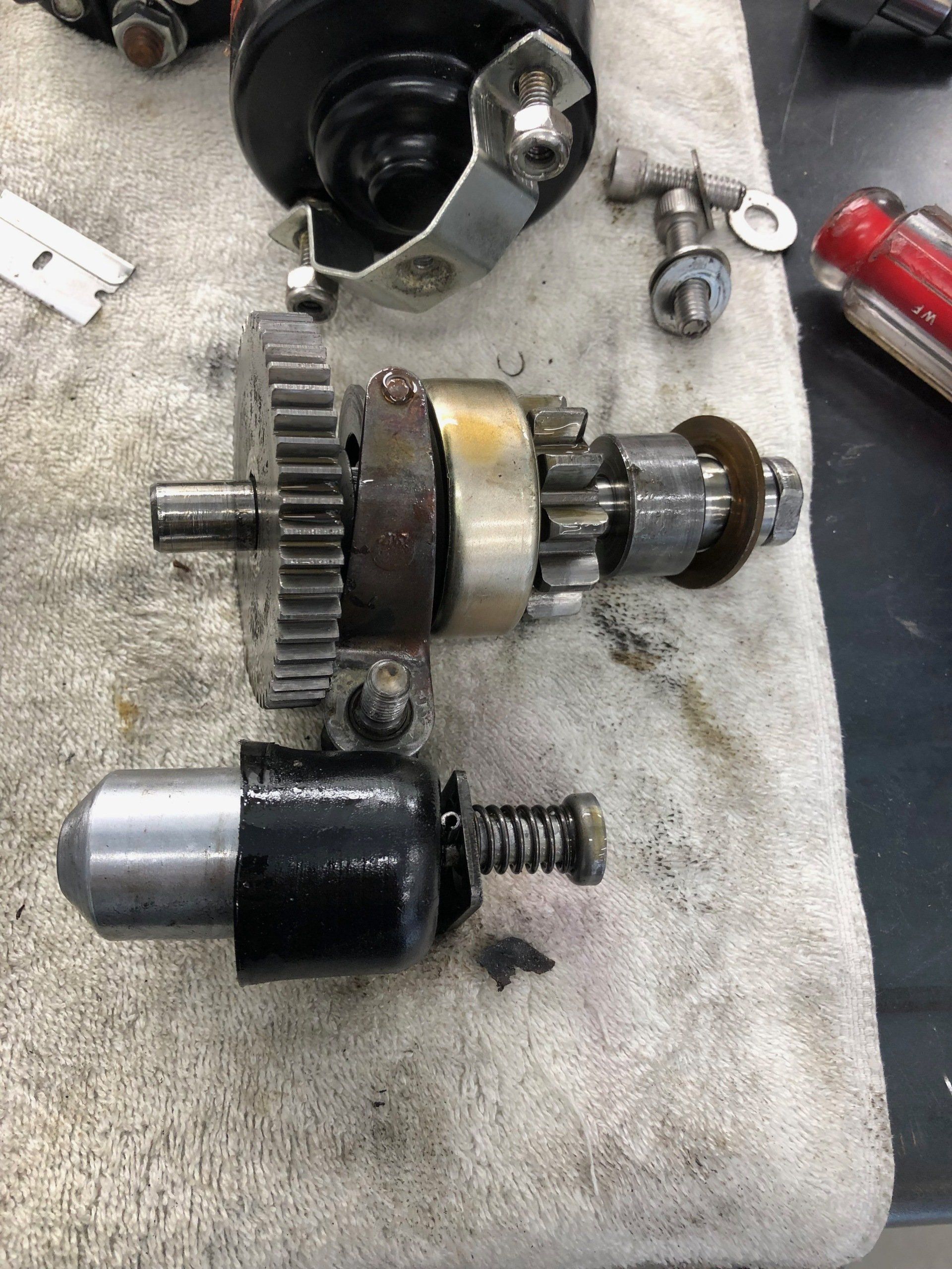 A close up of a gear on a towel on a table.