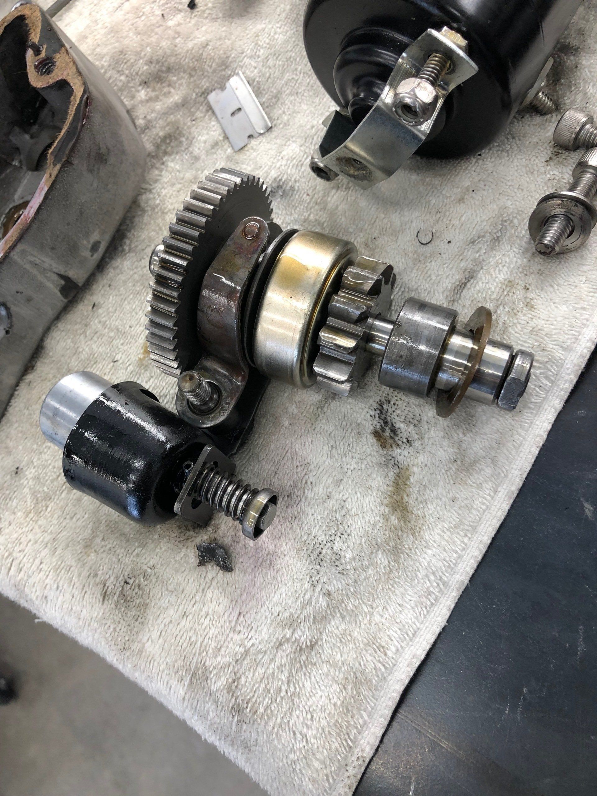 A close up of a gear on a towel on a table.