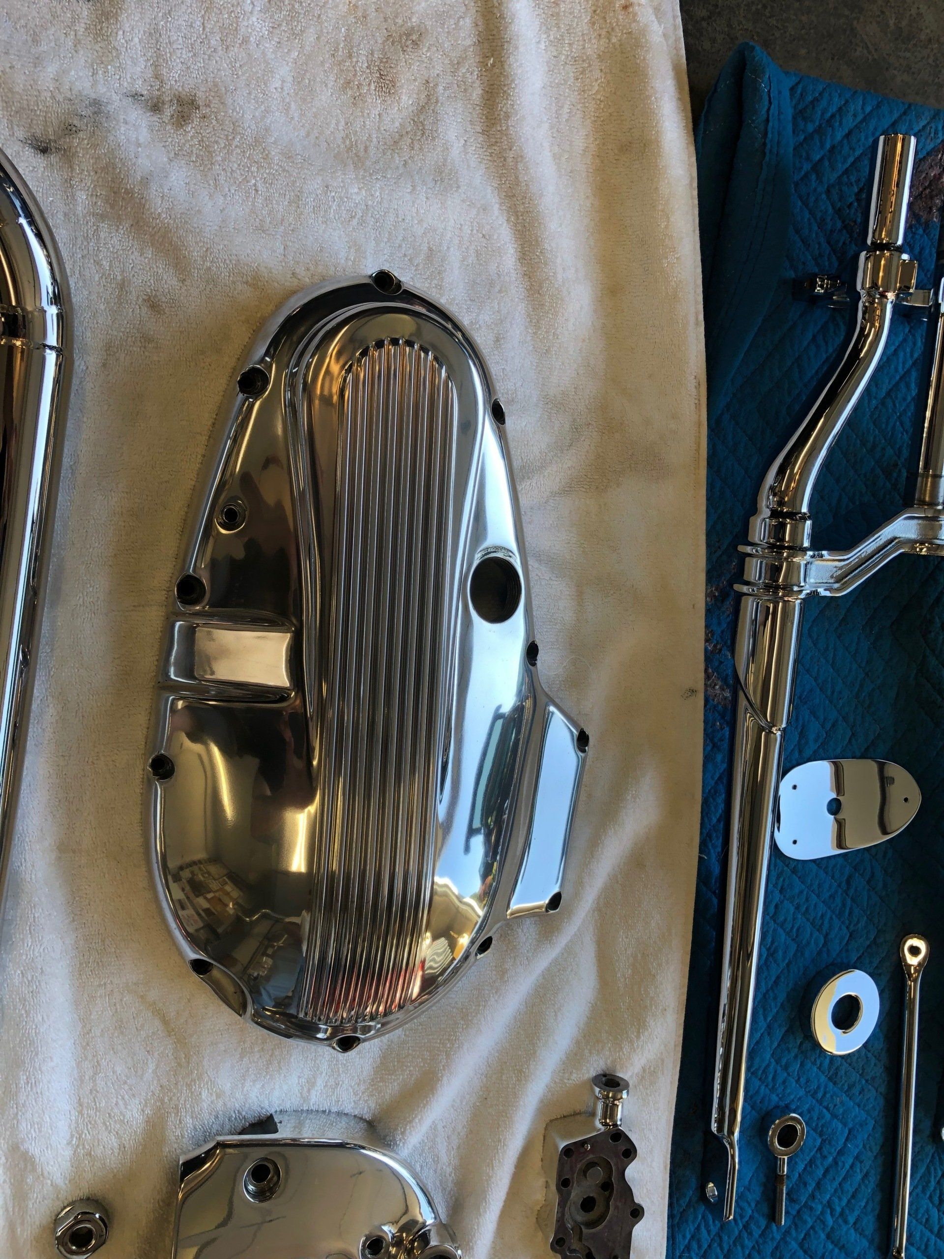 A close up of a motorcycle parts on a towel