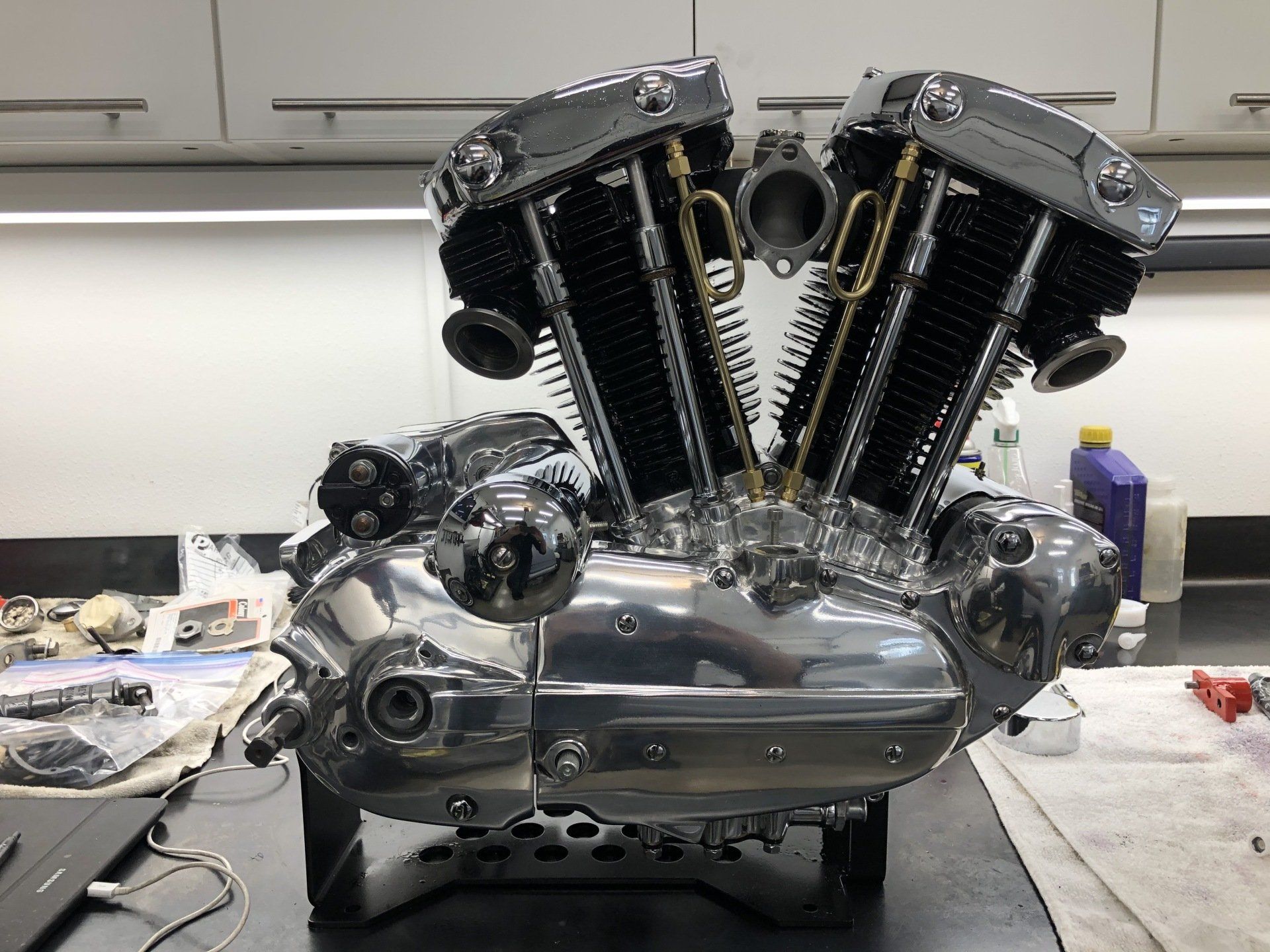 A close up of a motorcycle engine on a table