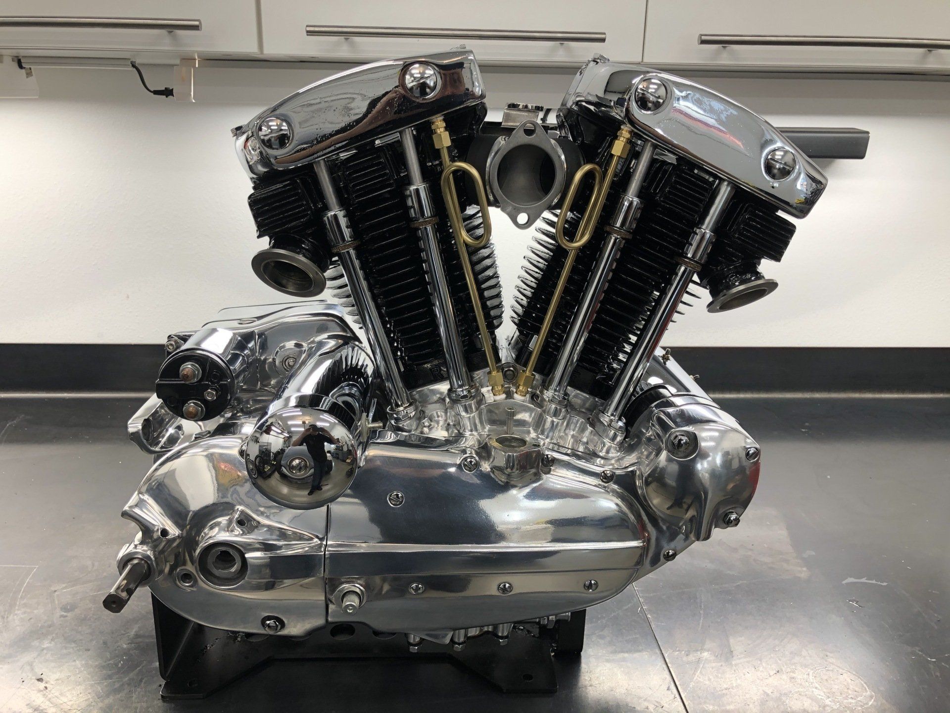 A close up of a motorcycle engine on a table