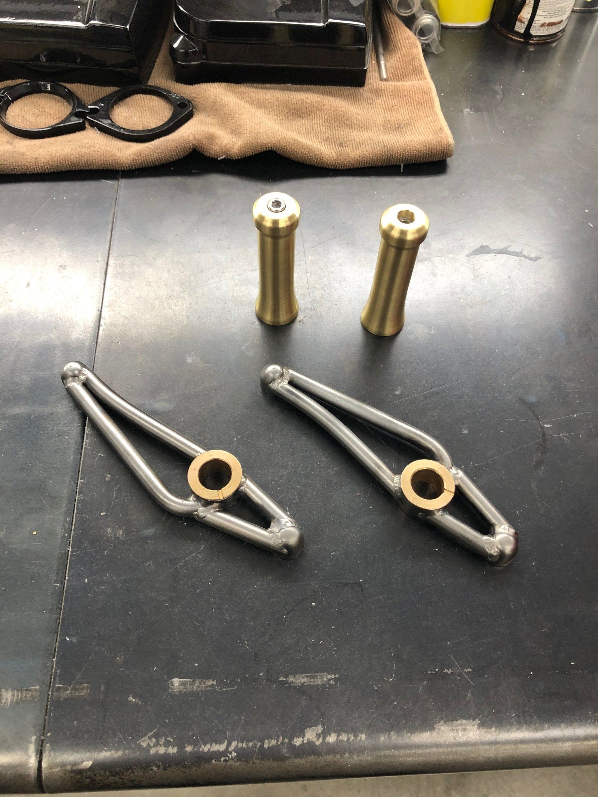 A pair of scissors sitting on top of a table next to a pair of glasses.