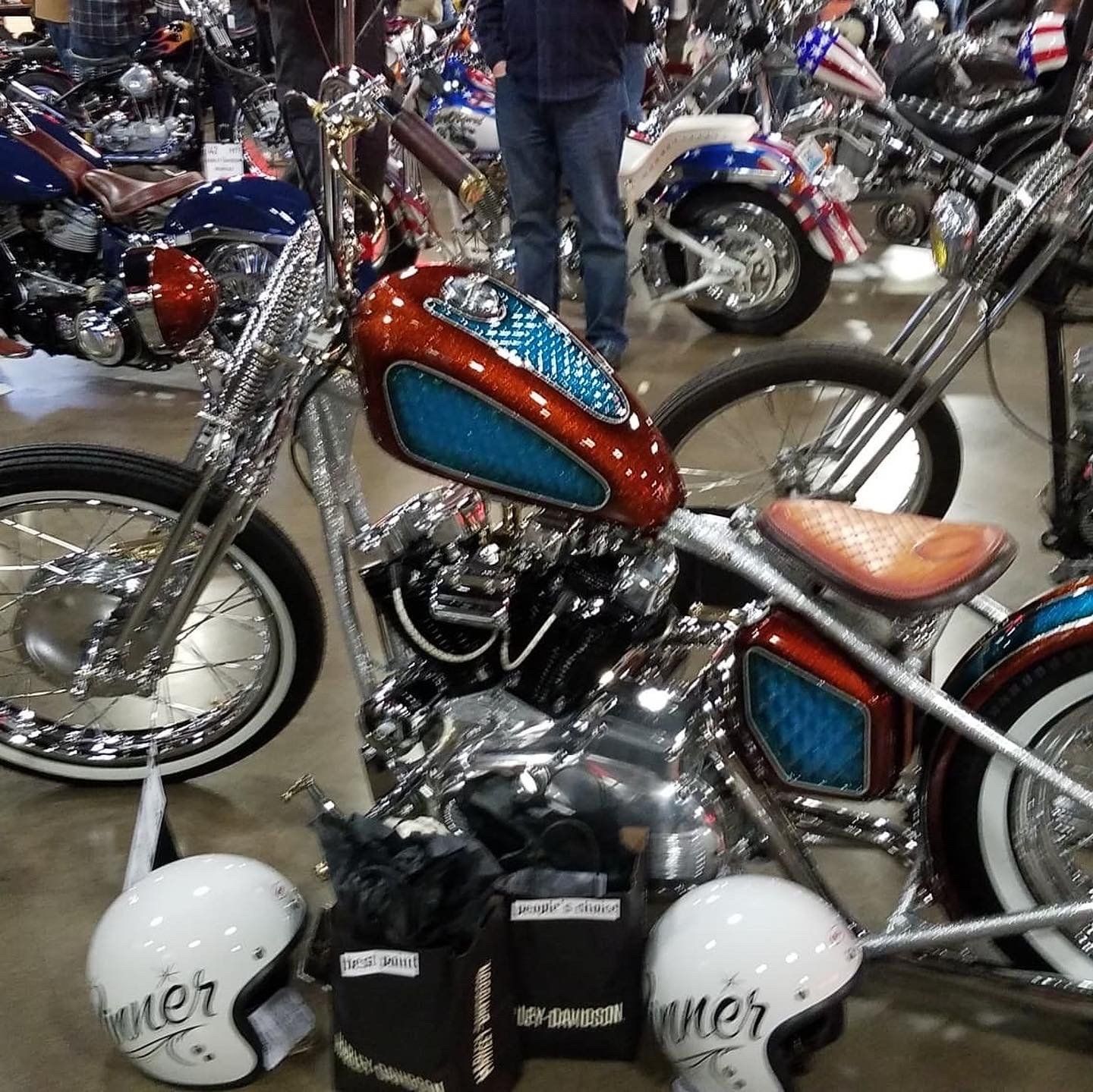 A motorcycle with a helmet that says alter on it