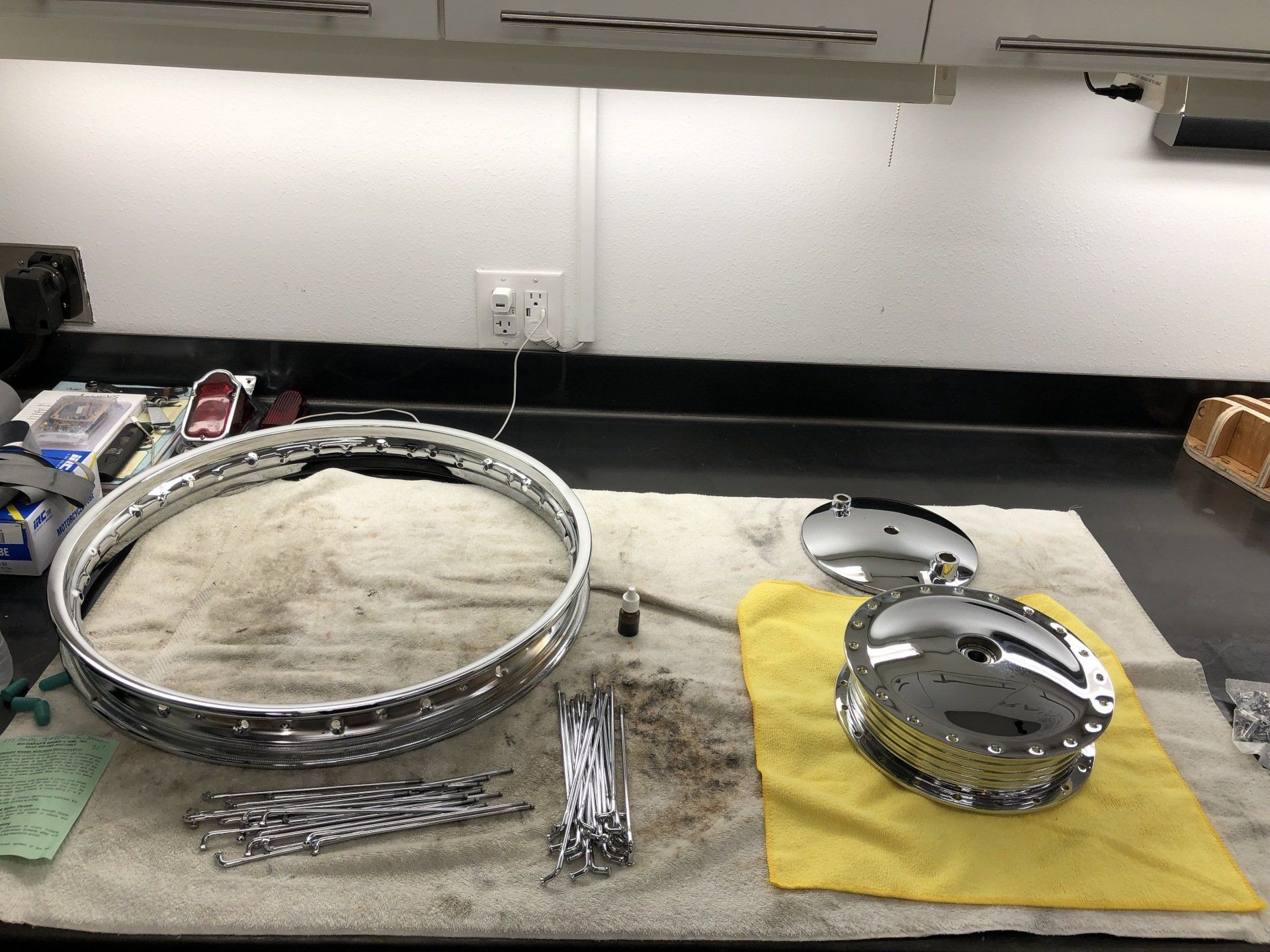 A drum ring is sitting on a towel on a counter.