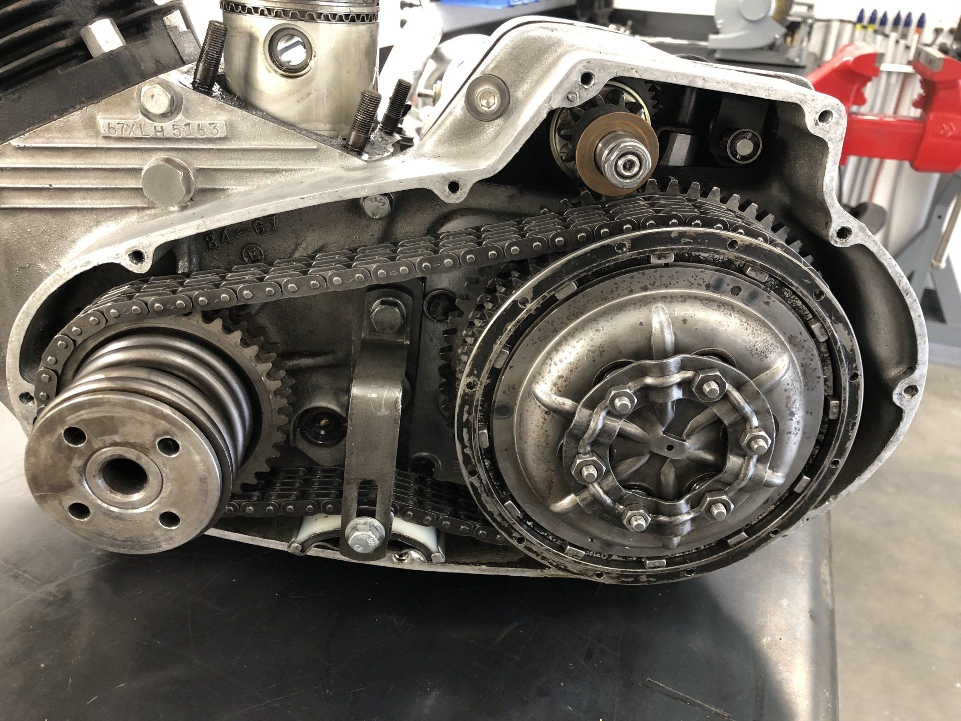 A close up of a motorcycle engine with the clutch removed.