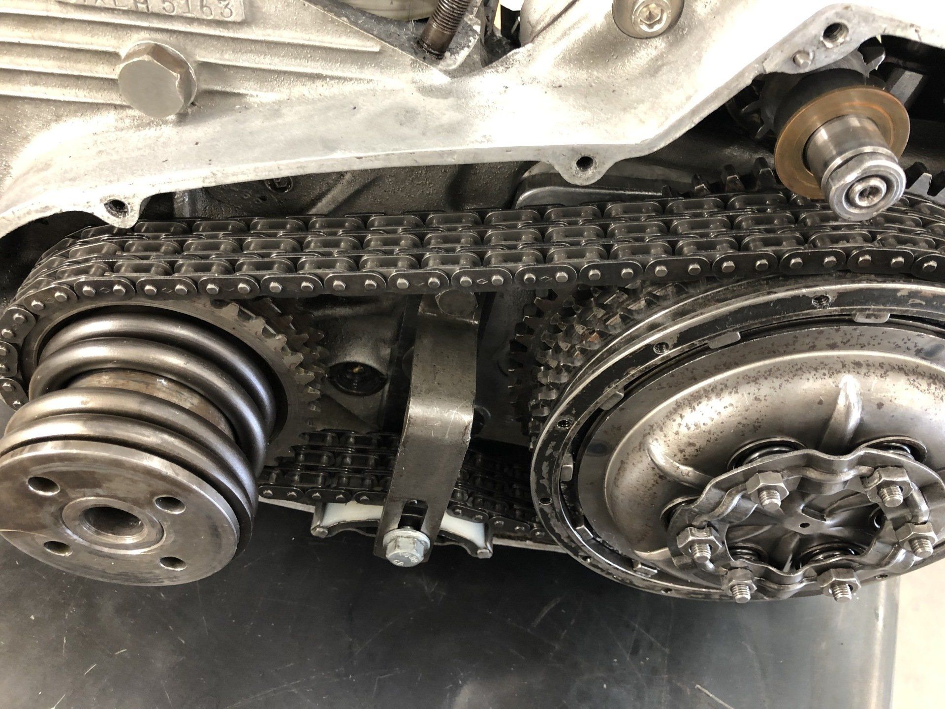 A close up of a belt on a motorcycle.