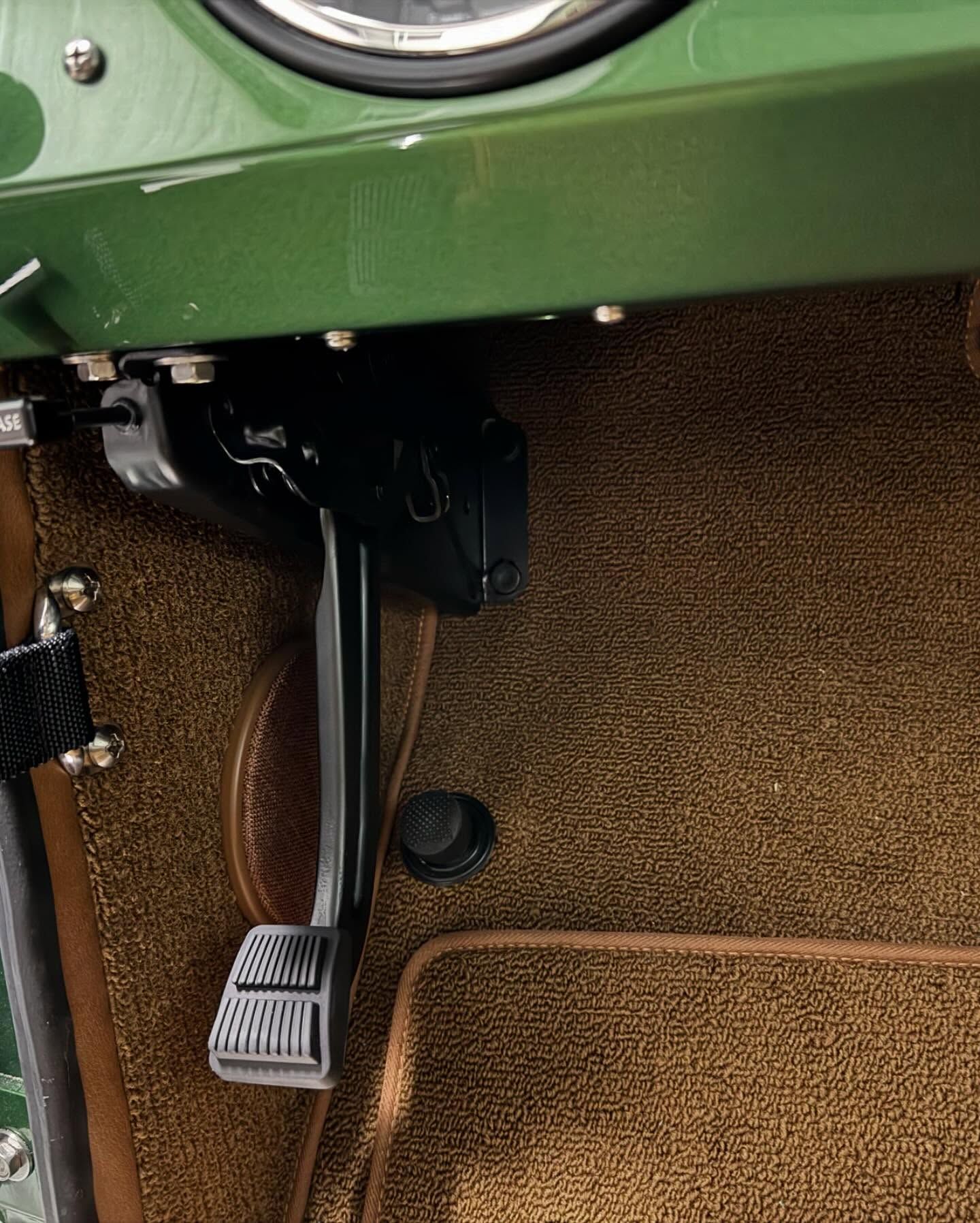 A close up of a brake pedal in a car